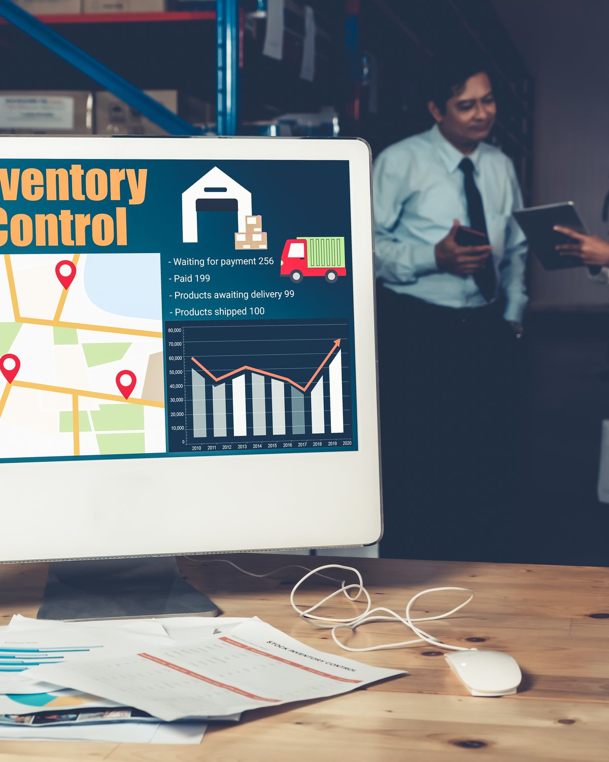 Freight logistics dispatch control room — tracking screens, professionals at workstations
